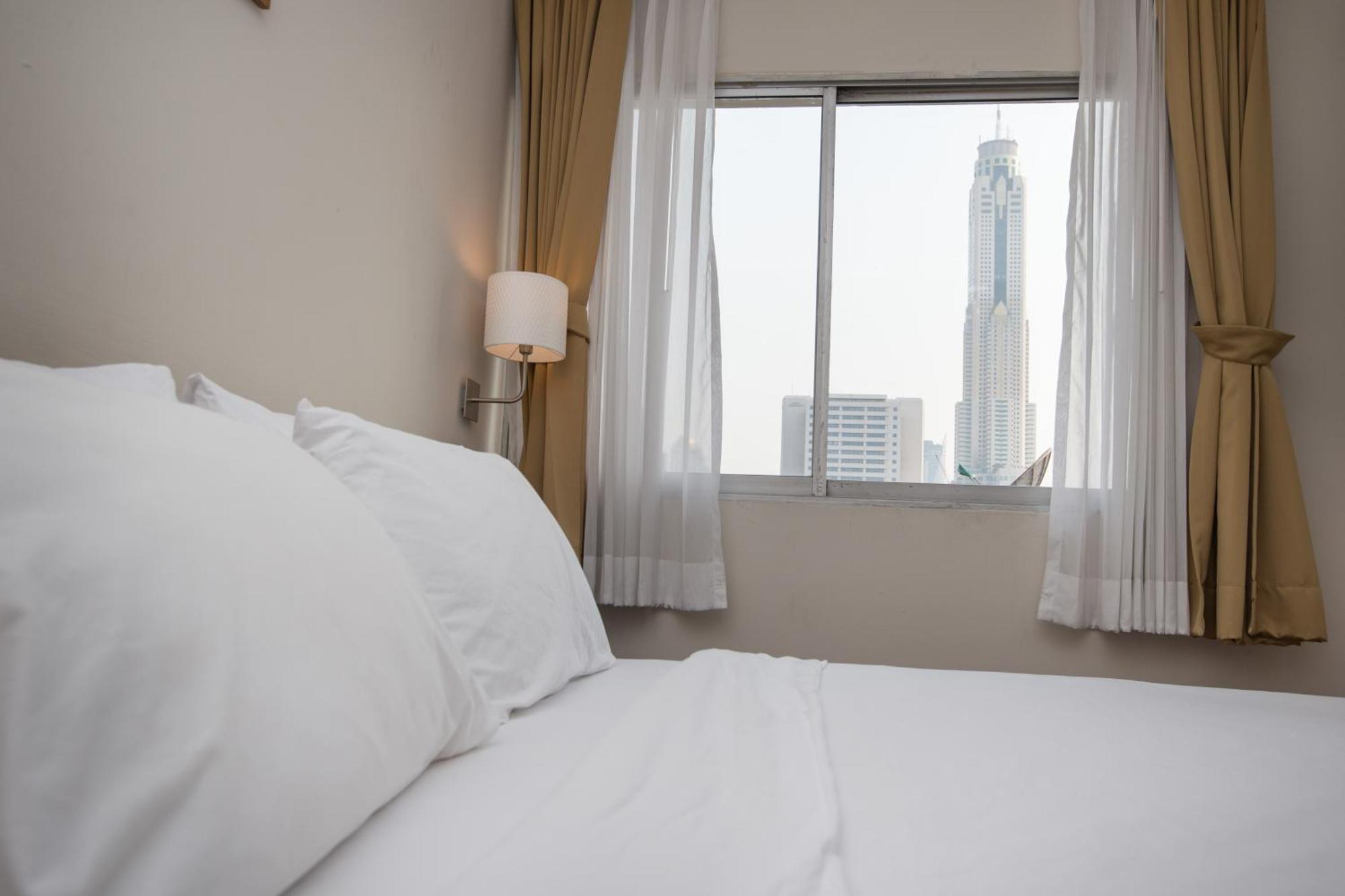 Seasons Siam Hotel Bangkok Rum bild